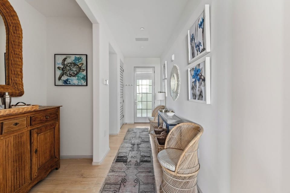 Arrive with ease through this airy, coastal-inspired entryway.
