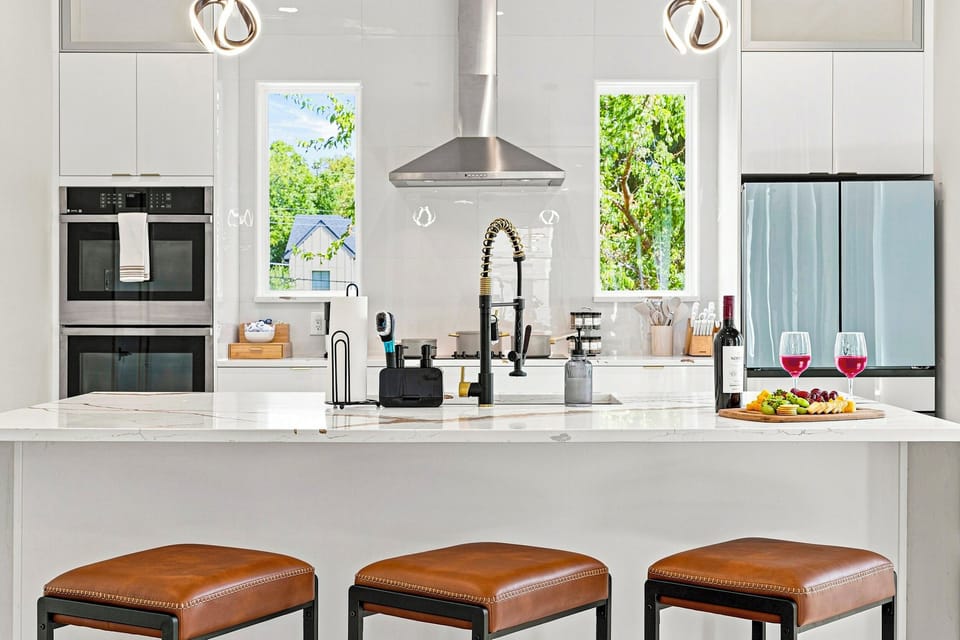  Modern appliances, sleek marble counters, and vibrant views await your culinary adventures!
