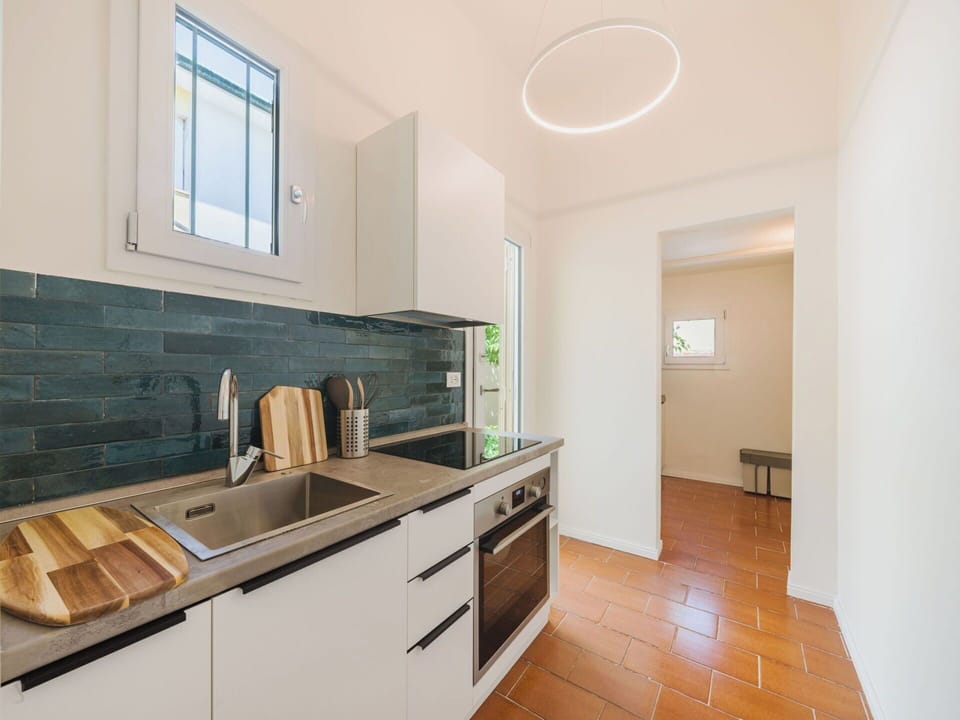 Countertop, Flooring, Interior Design, Kitchen, Wood, Furniture, Ceiling, Floor, Kitchen Appliance, Major Appliance