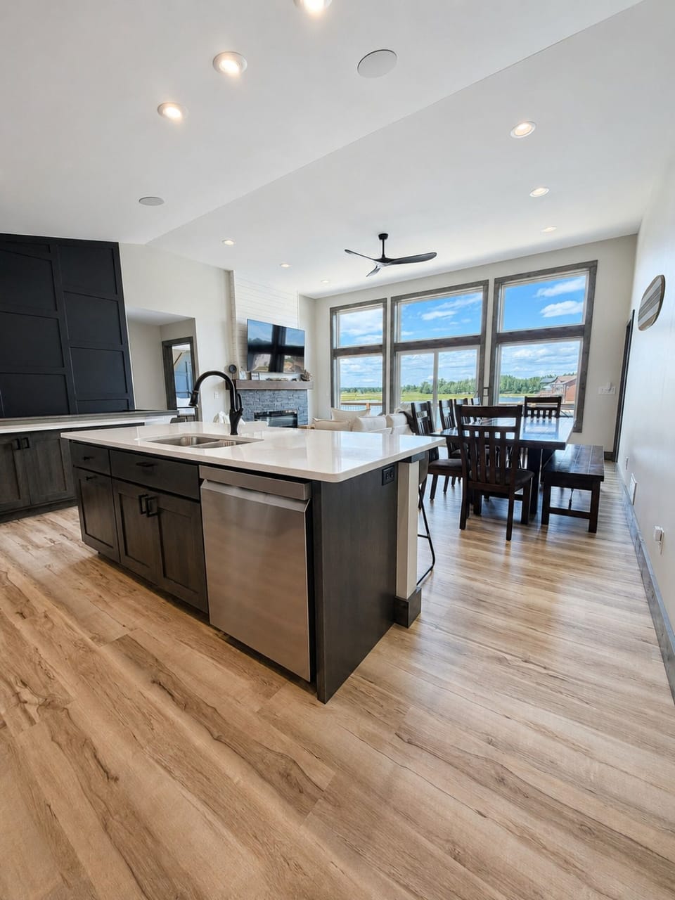Spacious kitchen island and dining area with beautiful lake views.