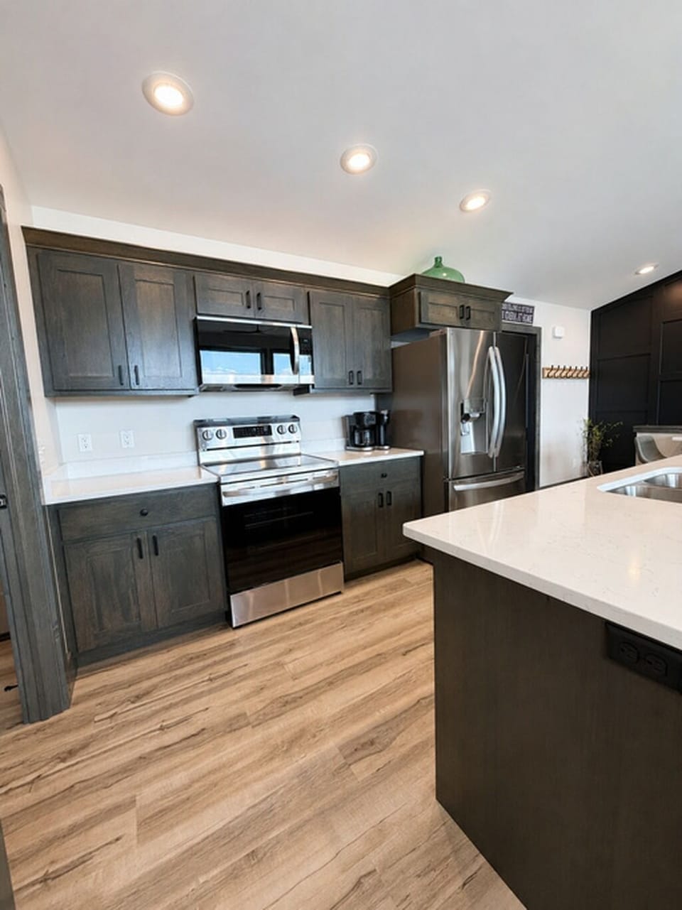 Fully equipped kitchen with modern appliances and space for group meals