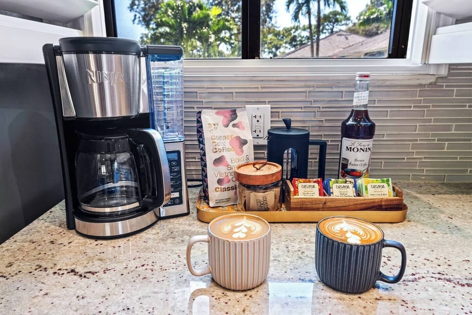 Start your day with our gourmet coffee bar featuring premium coffee, syrup, and brewing options or simply enjoy a cup of tea — a touch of luxury for your tropical mornings.