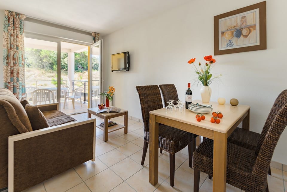 Dine or gather around the dining room table.