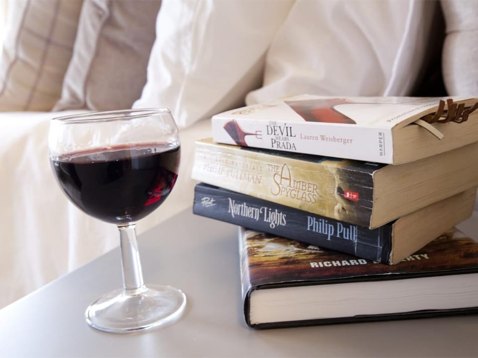 A glass of red and a good book, time to relax