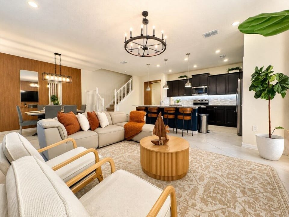 Comfortable family living area with direct connection to the kitchen and dining spaces.