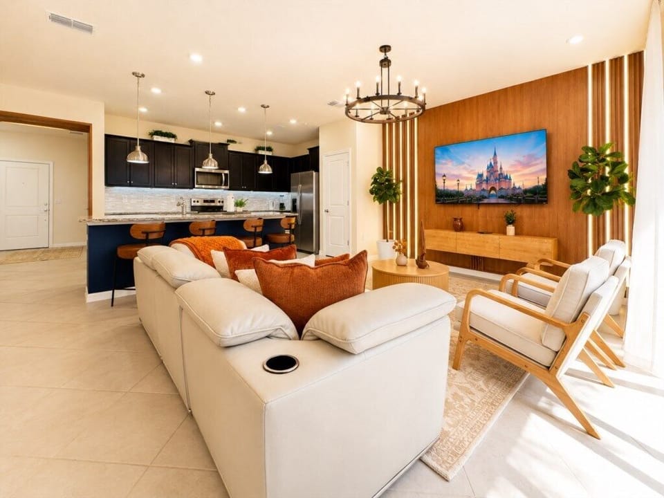 Spacious living room with comfortable sectional seating and a bright open-concept layout.