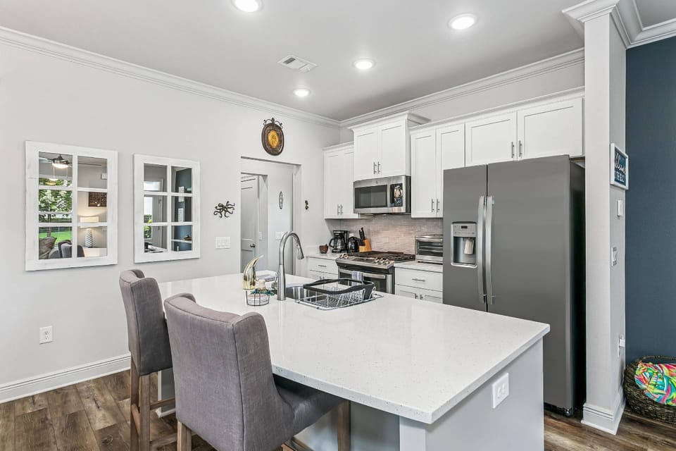 Bar seating for 2 at the oversized kitchen island