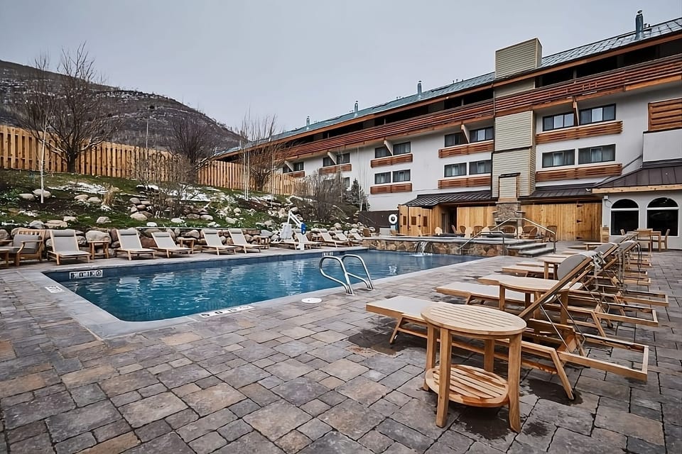 Unwind with plenty of loungers and wide-open pool views.