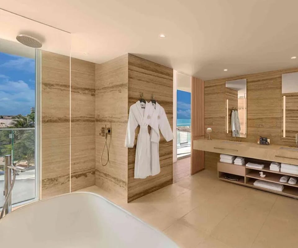 Refresh in a spa-like bath with luxe finishes and serenity.