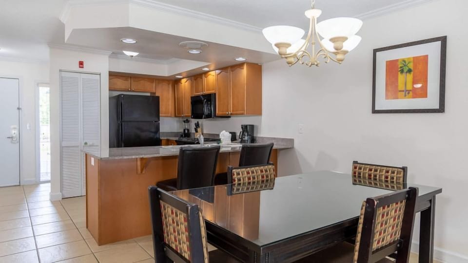 Gather for meals with roomy dining space beside the kitchen