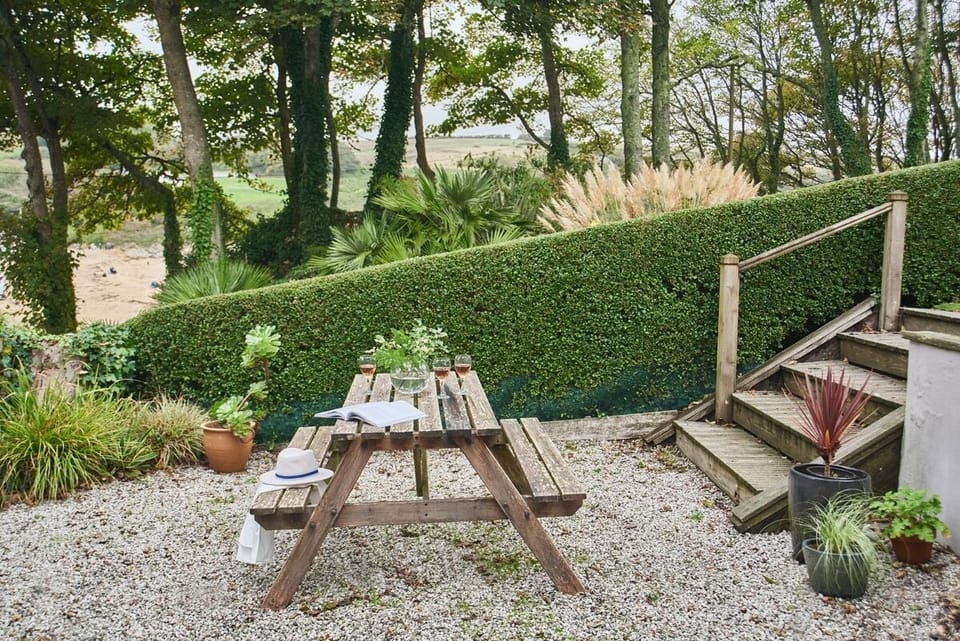 Outdoor courtyard at Avalon Beach House luxury coastal retreat near Maenporth Beach Cornwall