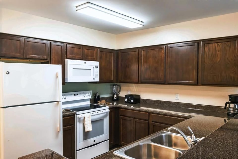 Full kitchen equipped for home-cooked meals