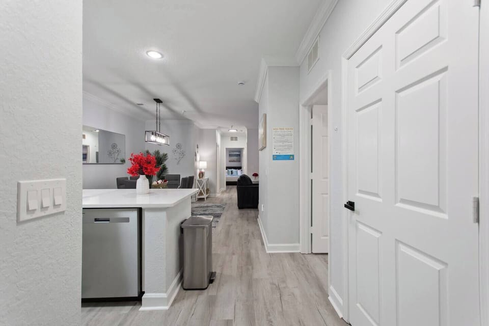 Step through the front door to an inviting open-concept space where the kitchen, dining, and living areas flow together—bright, welcoming, and perfect for gathering and making memories.