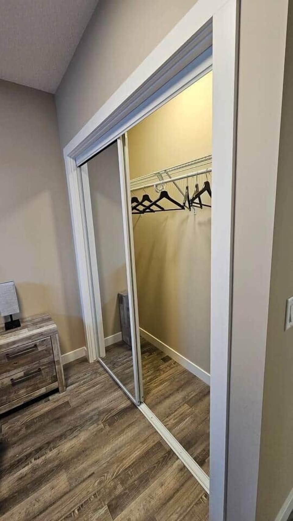 Spacious wardrobes with mirrors for your clothes.