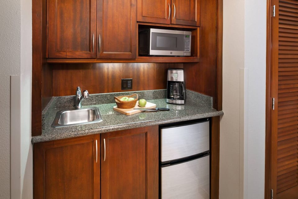 Well-equipped kitchenette with mini fridge, microwave, coffee maker