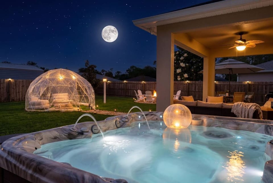 Your private oasis awaits under the Florida stars — soak in the bubbling hot tub while the illuminated glamping dome glows beside you. The ultimate backyard escape, day or night.
