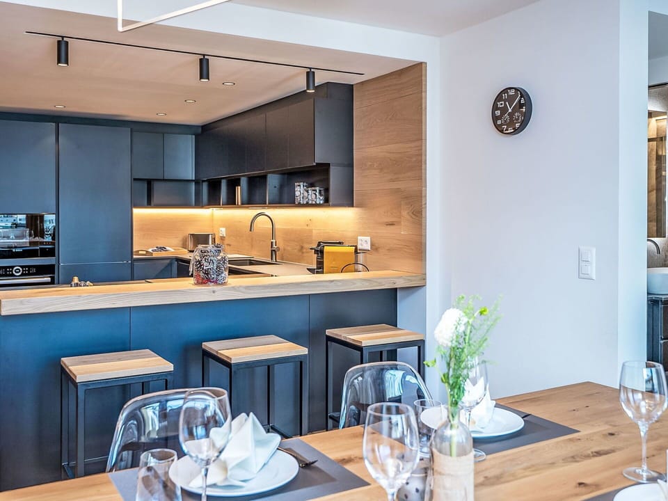 Furniture, Kitchen, Interior Design, Countertop, Flooring, Wall, Wood, Cabinetry, Chair, Ceiling