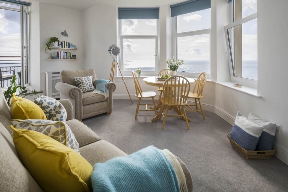 Comfortable lounge with sea views at Epic View apartment
