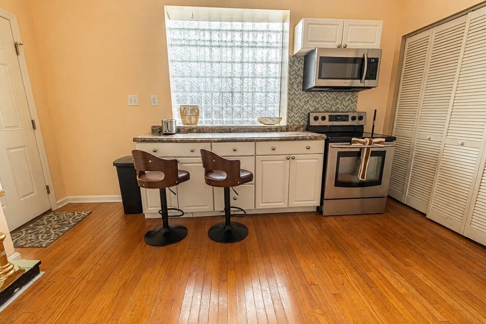 Unit A’s fully equipped kitchen offers everything you need for preparing meals, from morning coffee to family dinners.