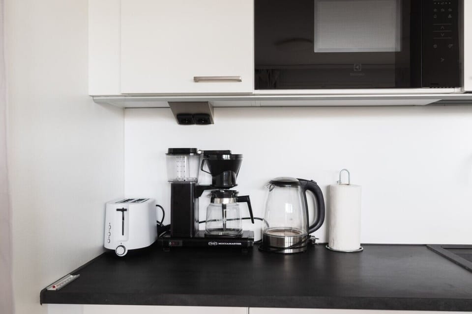 Coffee station with Moccamaster, kettle, and toaster, Padisentie 8 C 12