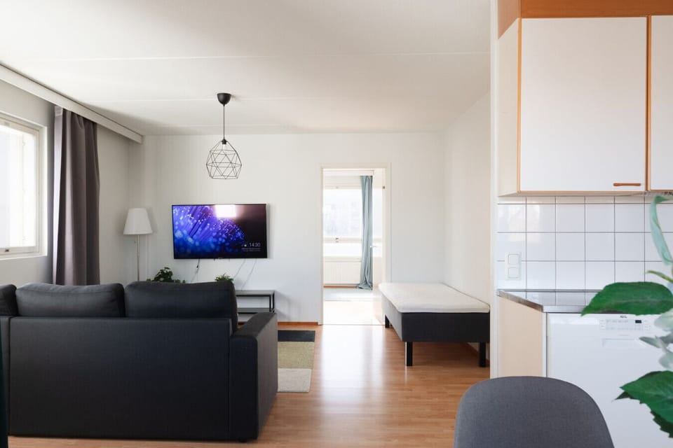 The living room with a single bed and sofa bed for two