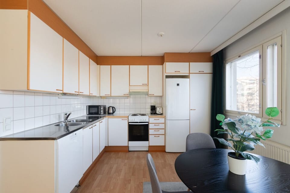 The kitchen with dining table for four
