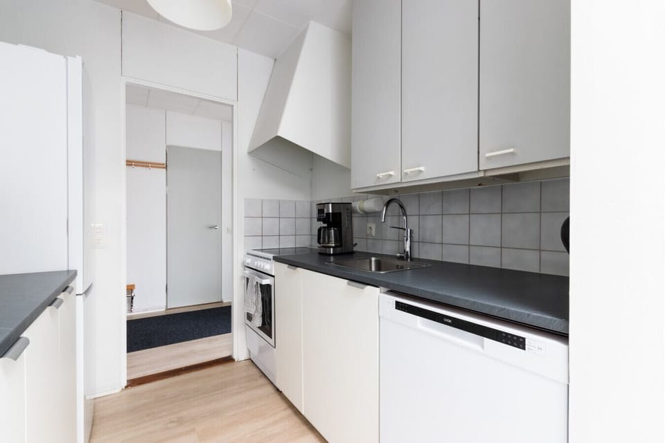 Kitchen has basic cooking equipment.
