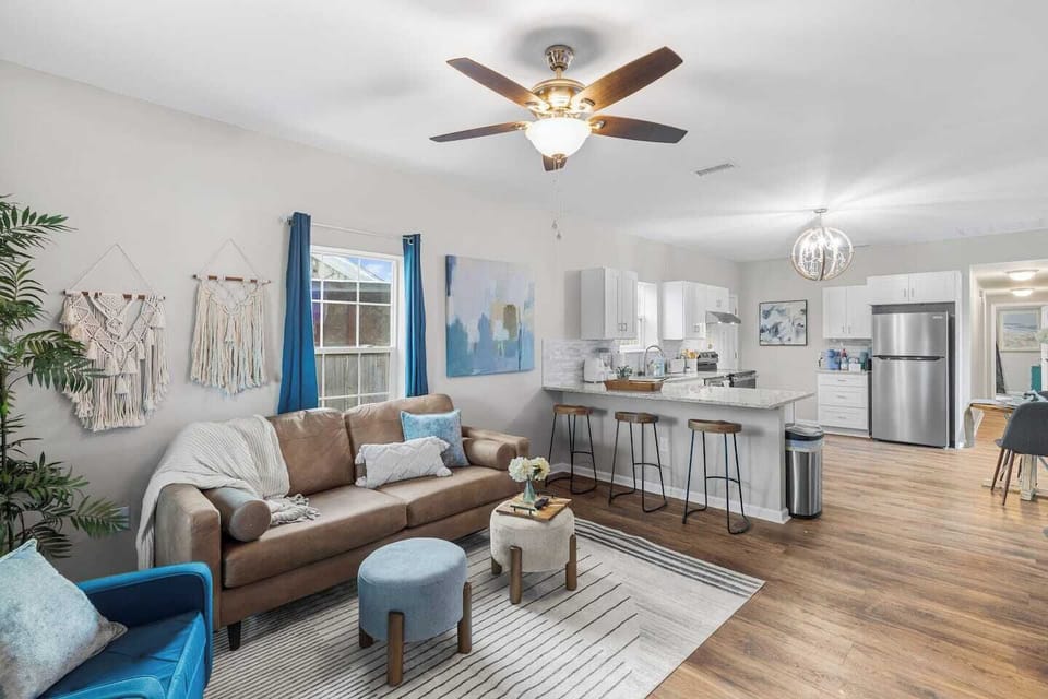 Newly renovated open-concept living! Perfect for families and traveling contractors alike, this modern layout keeps everyone connected. Enjoy luxury vinyl floors and stylish decor in a sun-filled space designed for long-term stays and relaxation.