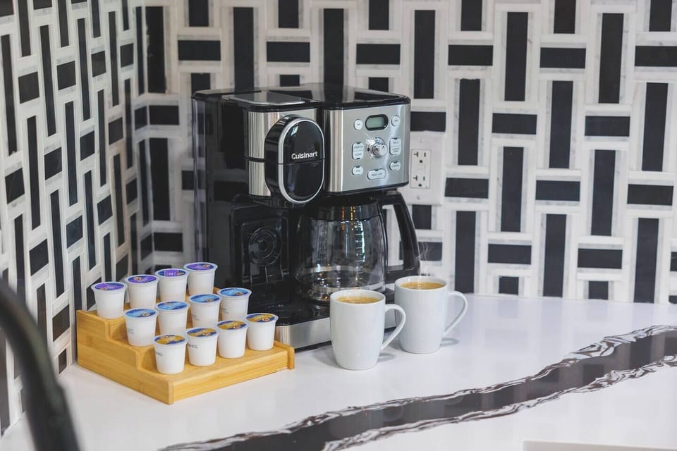 Brew up your mornings with a modern coffee maker & charming kitchen décor!
