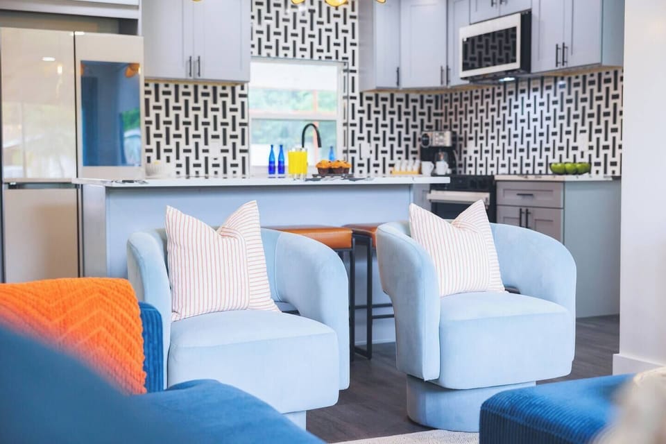 Bright colors & stylish furnishings create a cozy, welcoming living room retreat