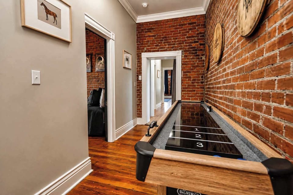 Hallway shuffleboard adds another round of friendly competition between rooms