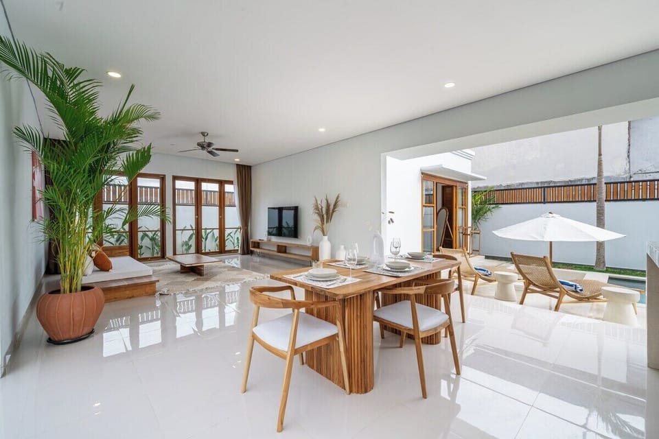 Living Room: Sunlit space with modern decor, perfect for gatherings and lazy afternoons!