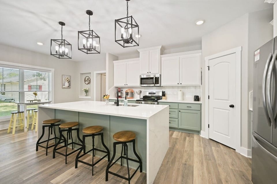 Gather around the oversized kitchen island with seating for four.