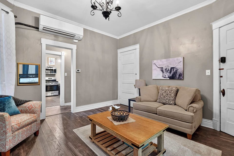 Living Room: Bright and welcoming living room with comfortable seating and a relaxed atmosphere, perfect for unwinding after a day of exploring or enjoying a quiet night in.