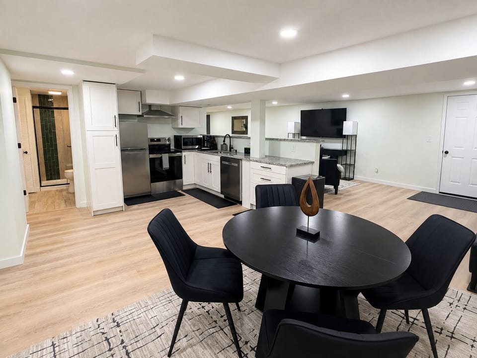 Basement kitchen and dining room area entertainment.