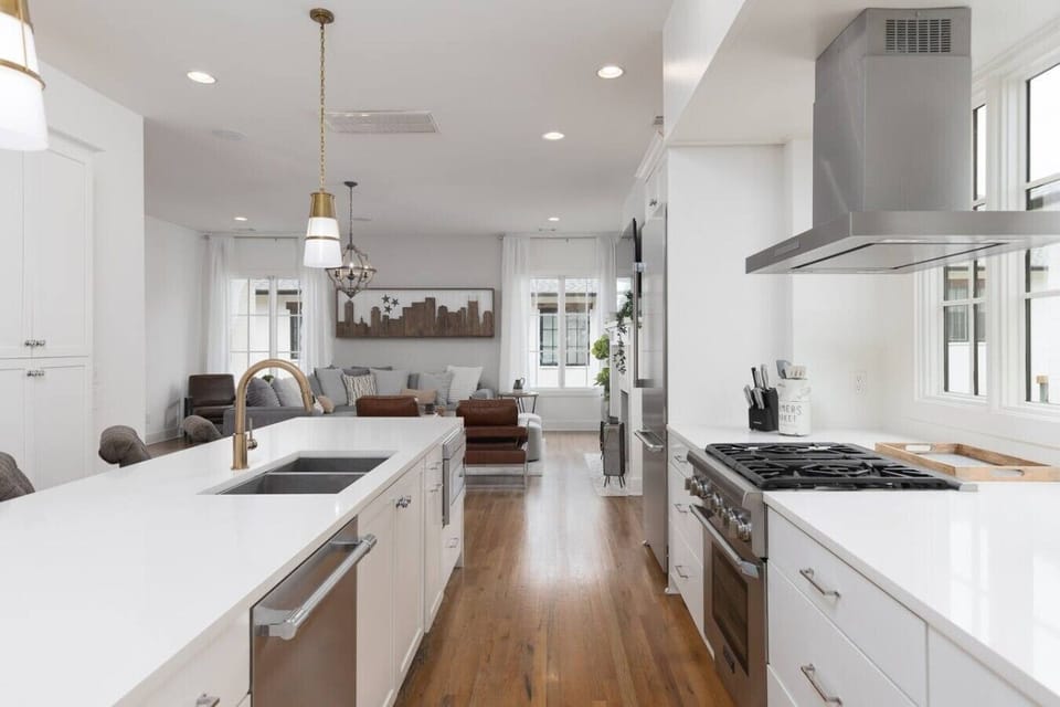 Fully equipped kitchen with stainless steel appliances, seating for 5 at the kitchen island, additional seating at the dining room table and all the dishware / utensils you might need.
