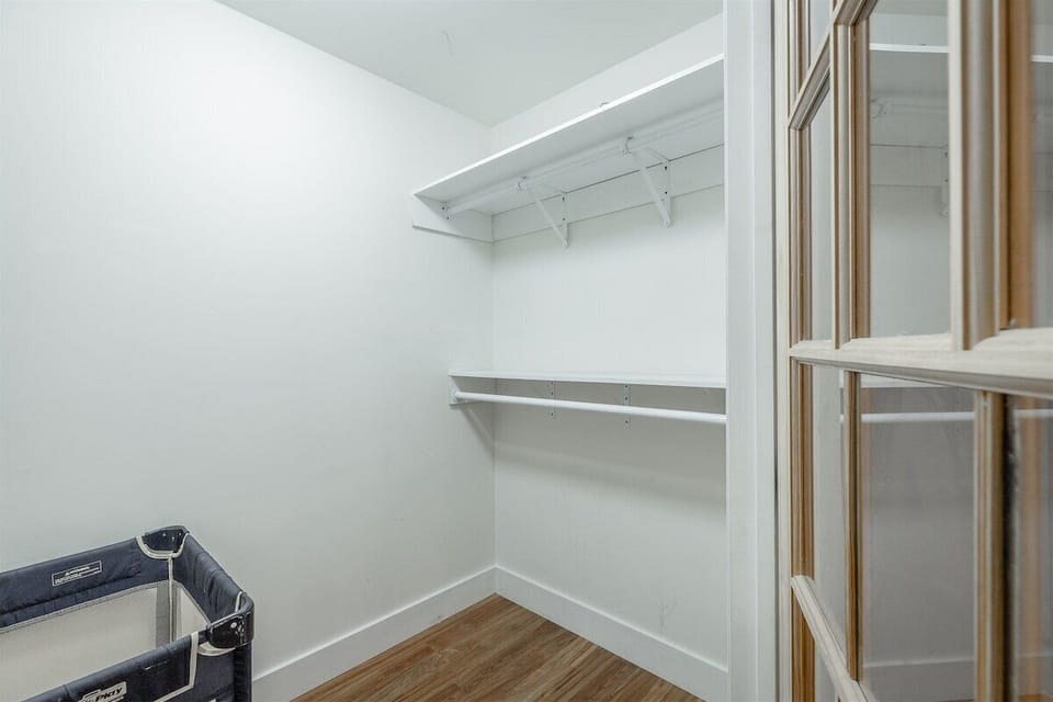 bedroom 2 closet pack n play  high chair