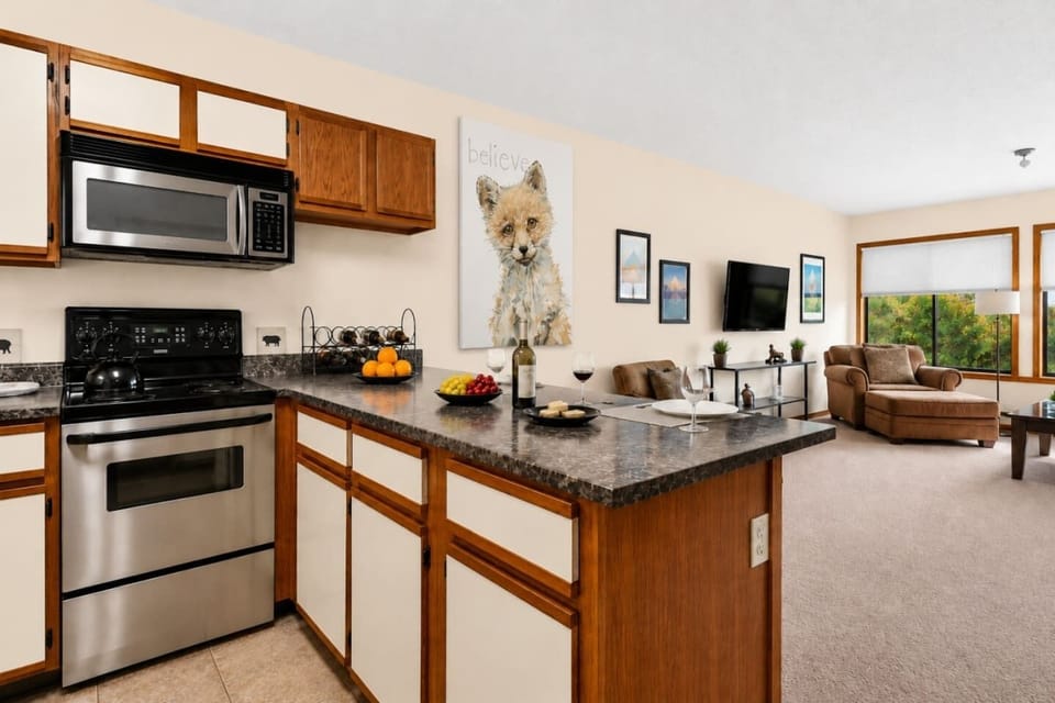 Spacious open-concept kitchen and living area, perfect for cooking, dining, and relaxing together.