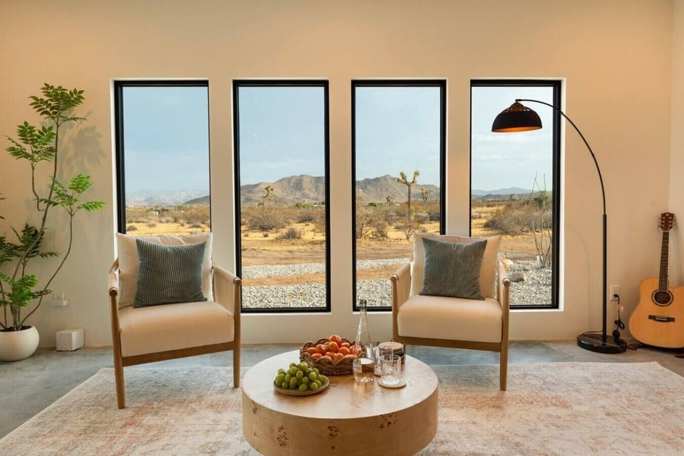 Settle into the sunlit living room and enjoy uninterrupted views of the desert and mountains.