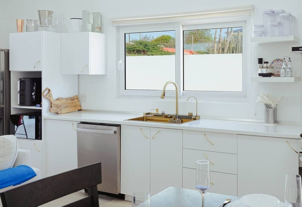 Fully equipped kitchen with plenty of counter space, a dishwasher, coffee maker, and everything you need to prepare meals during your stay.