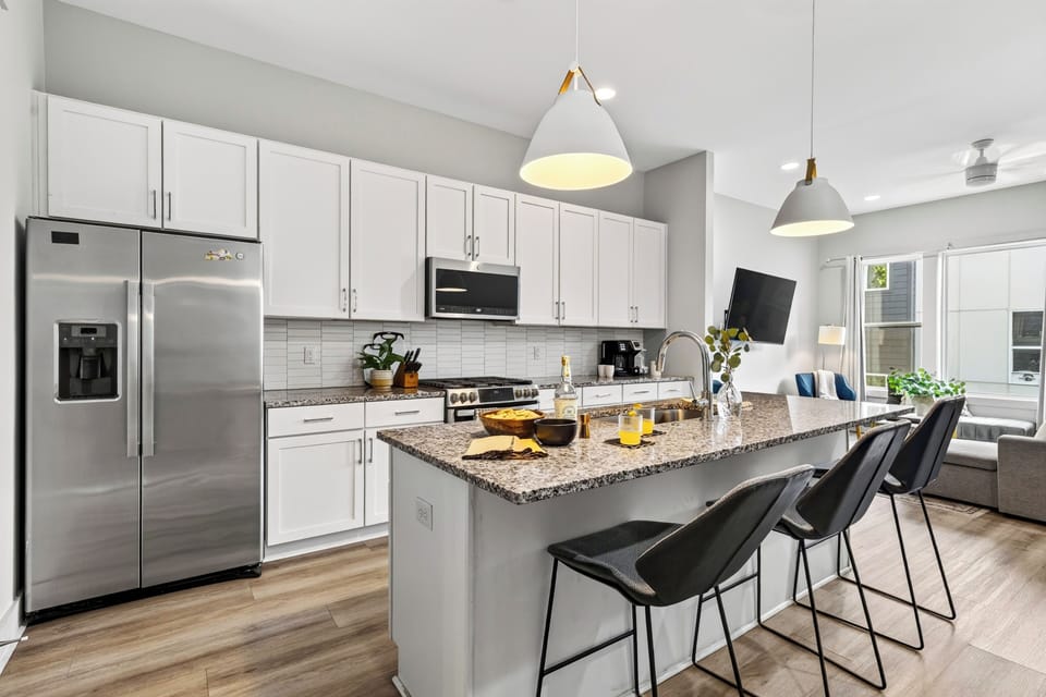 Kitchen with island seating and pendant lighting