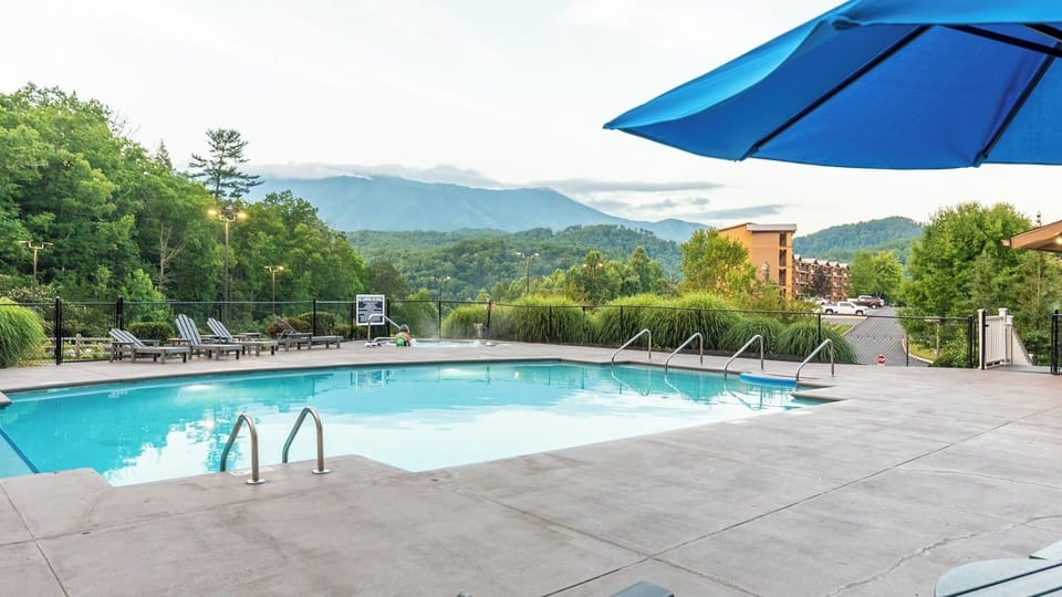 Outdoor Pool • Mountain Views & Lounge Deck