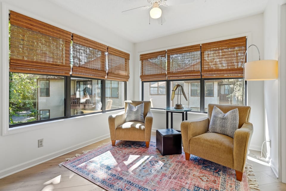 Separate Sitting Area with Two Chairs - A separate two-chair sitting area adds another place to read or talk beside the dining room and balcony.