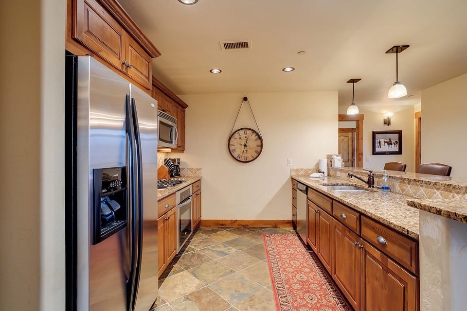 Your fully equipped kitchen makes vacation cooking easy with granite countertops, stainless steel appliances, and all the space you need to prepare favorite meals together.