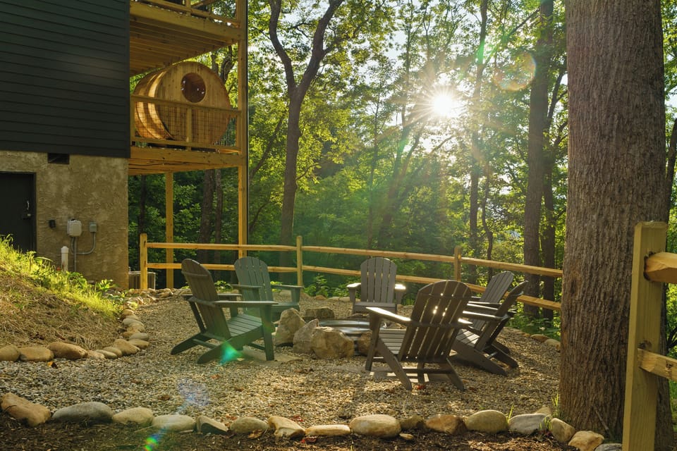 A true Smoky Mountain setting. Relax around the fire pit while the late-afternoon sun filters through the surrounding forest.