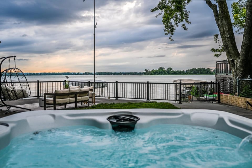 Soak with a view. The private hot tub overlooks Lake Manawa for the perfect way to relax after a day on the water or exploring Omaha.