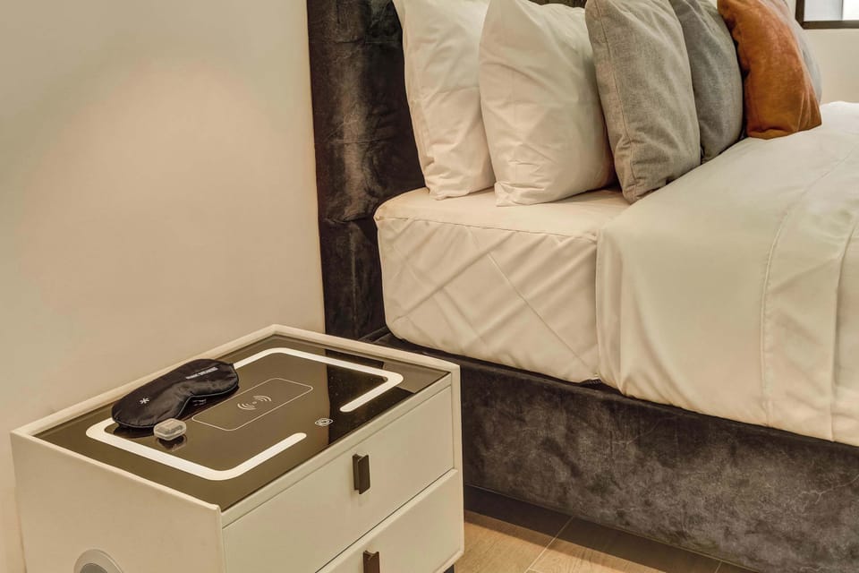 A practical detail next to the bed