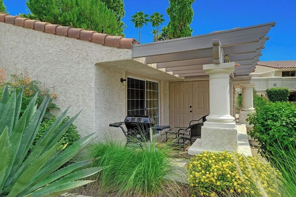 MASTER BEDROOM PATIO REVERSE - Oranj Palm Vacation Homes.jpg