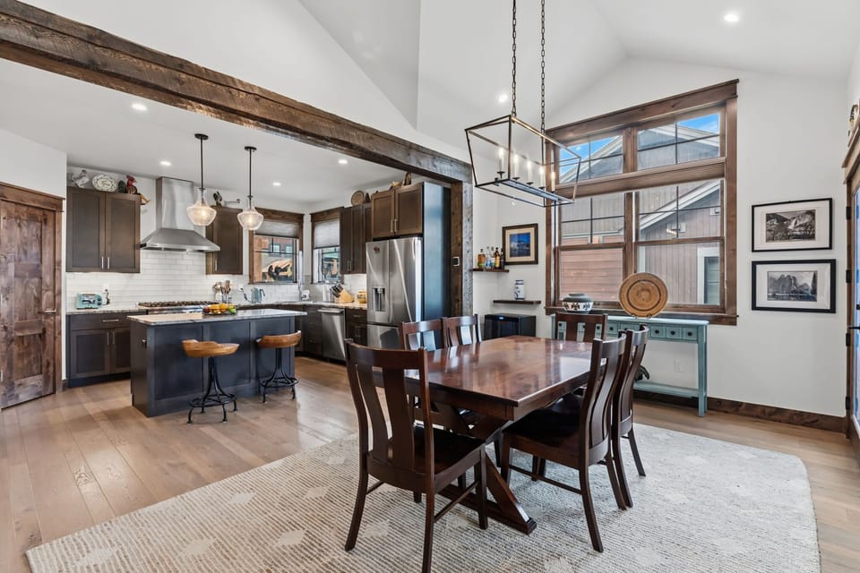 Dining room: Dining table with seating for 6, kitchen island with seating for 2
