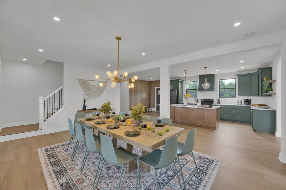 Spacious open-concept layout seamlessly connecting the kitchen and dining area, creating the perfect space to cook, gather, and spend quality time together.